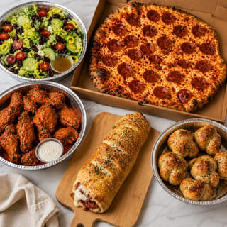 1 large one topping pizza, 10 wings, Large caesar or tossed Salad, Small Stromboli, 6 Garlic Knots $52.95